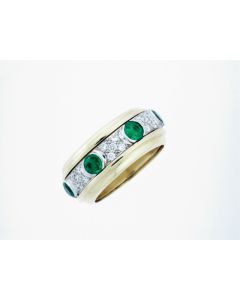 18 K Two-Tone Gold Interchangeable Turning Centre Diamond And Emerald ring.